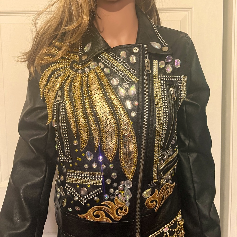 One of a kind jacket. 
Eye catcher! Very unique! 
Size small